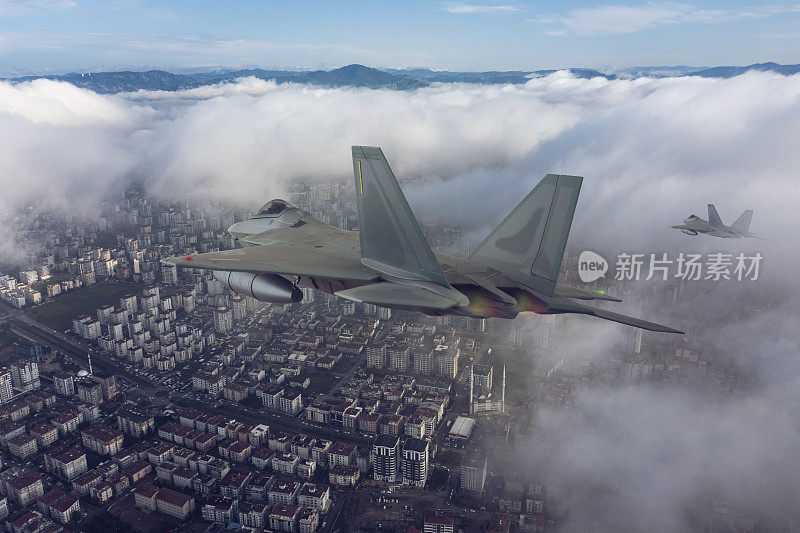 喷气式战斗机飞过城市上空。