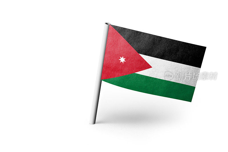 约旦国旗被钉住。白色背景。