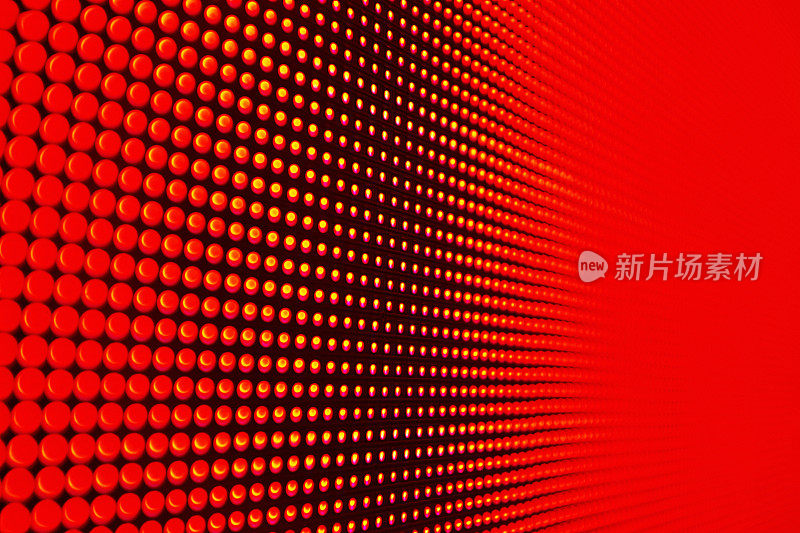 现代LED标识的细节，显示饱和红色和橙色的单个像素
