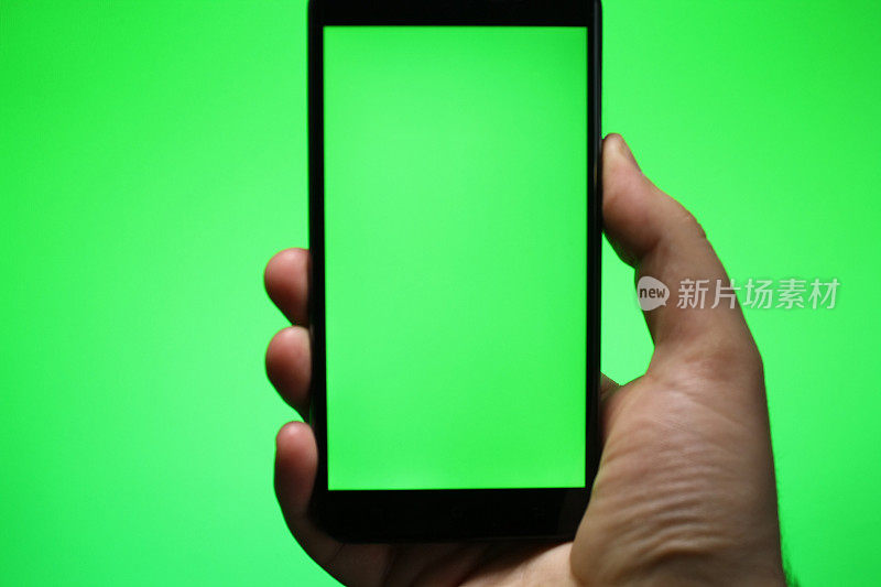 绿色屏幕和绿色背景的智能手机
