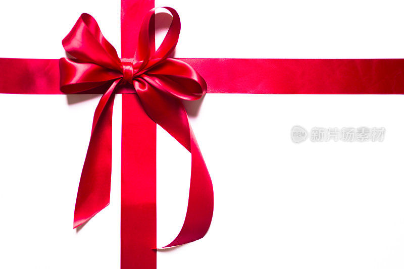 缎带上的红色蝴蝶结。白色的礼物。圣诞节,情人节。