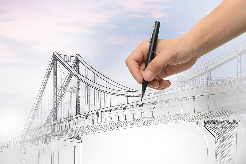 一个人在画桥，特写。企业合作的概念