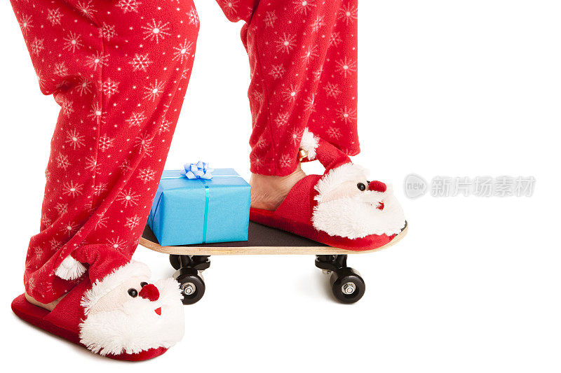 圣诞老人带着礼物上滑板