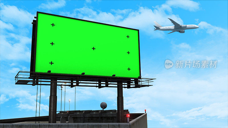 建筑物顶部的大型绿色屏幕广告牌