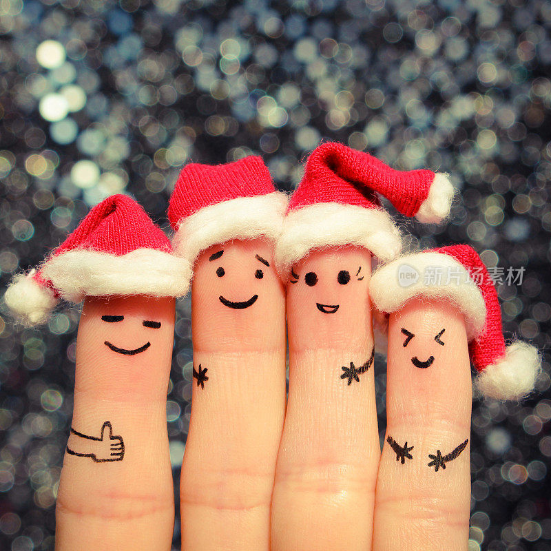 朋友的手指艺术庆祝圣诞节。