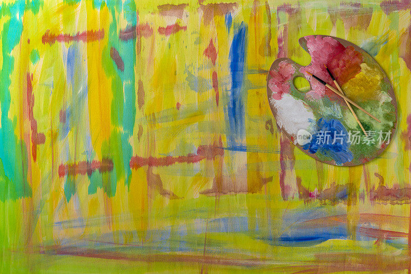 抽象生动的背景画在生动的颜色黄，红，绿，蓝和调色板