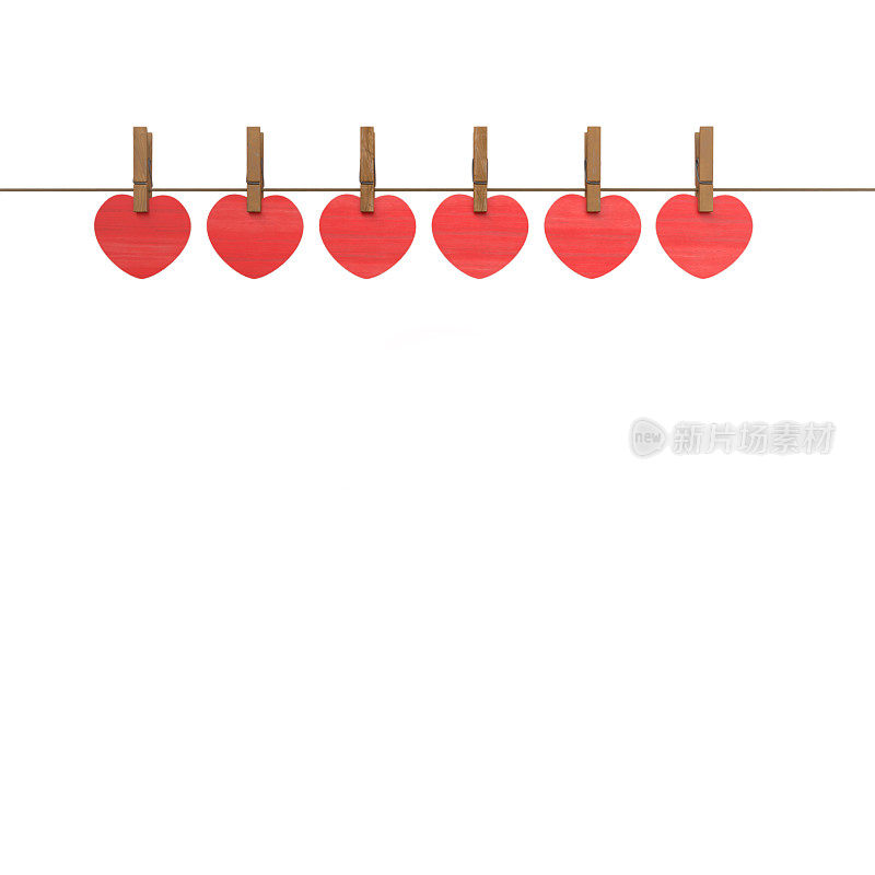六个木钉和六个红纸心夹在绳子上。情人节的概念。