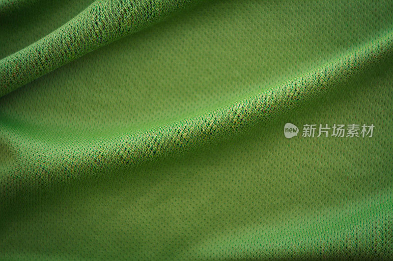皱巴巴的绿色织物纹理背景