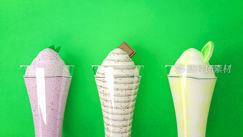 奶昔三人组，水果冰沙，鸡尾酒在绿色的背景
