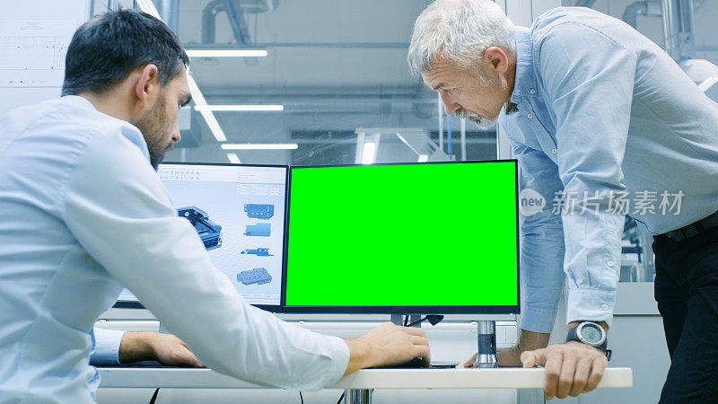 工业设计师与高级工程师的对话，而工作在CAD程序，一个有一个绿屏色度键模板伟大的模型。他从事双显示器个人电脑的研究。