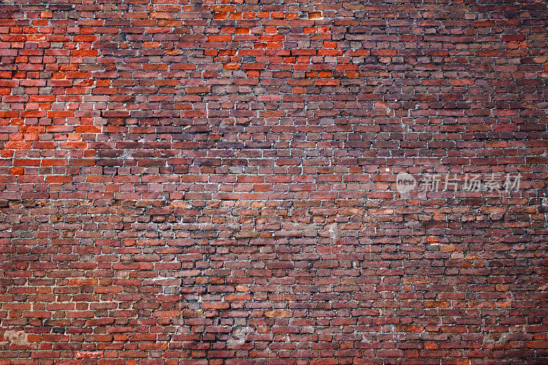 垃圾砖墙，红色纹理，背景风化表面