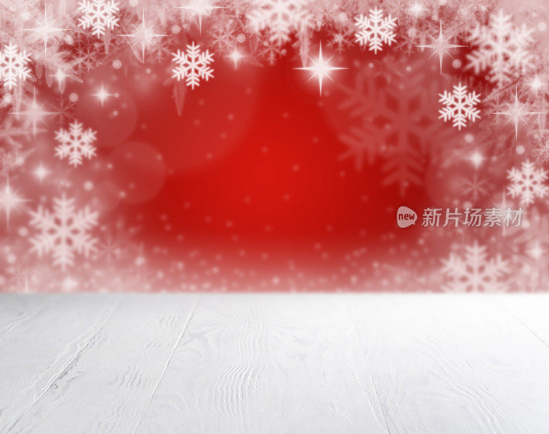 圣诞节的背景是雪花和红色的雪