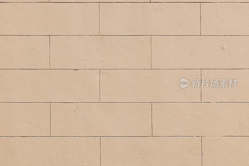 米色混凝土砌块墙的一部分