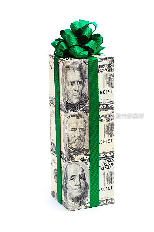 金钱礼物的美元纸币与绿色蝴蝶结在白色