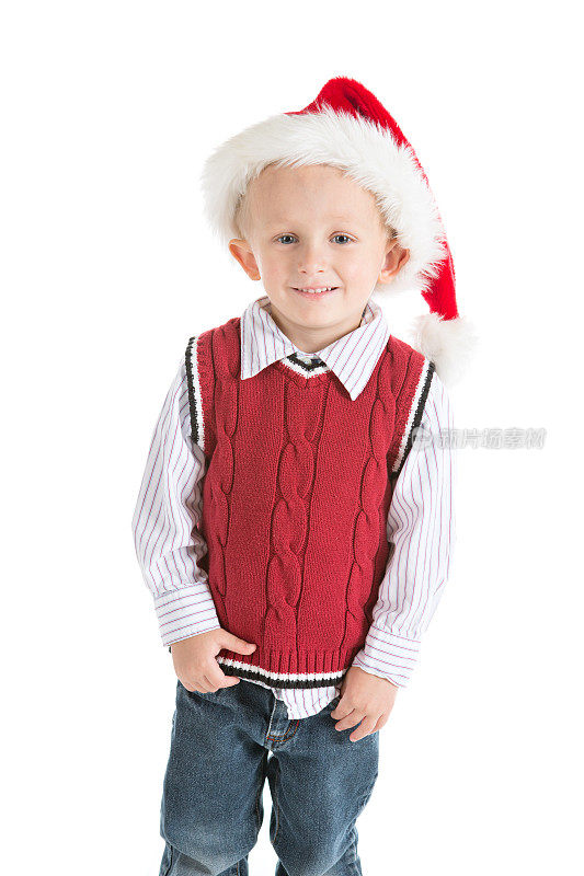 穿着毛衣背心和圣诞帽的学龄前男孩
