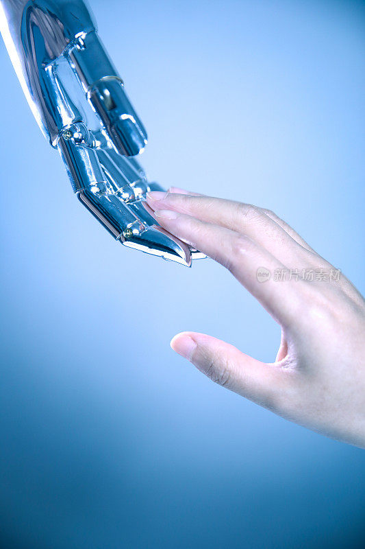 人类和机器人的手触摸