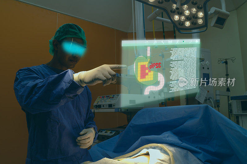 智能医疗技术理念，医生使用眼镜，利用增强现实显示患者的胃损伤进行分析，找到在医院手术室治疗的方法