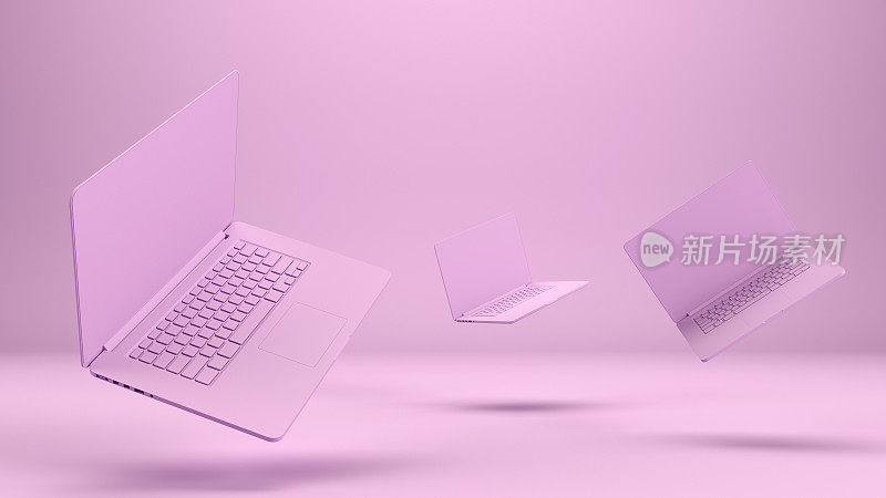 飞行空屏幕笔记本电脑在粉色背景，零重力