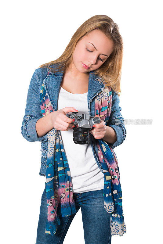 金发可爱的小女孩摄影师与相机