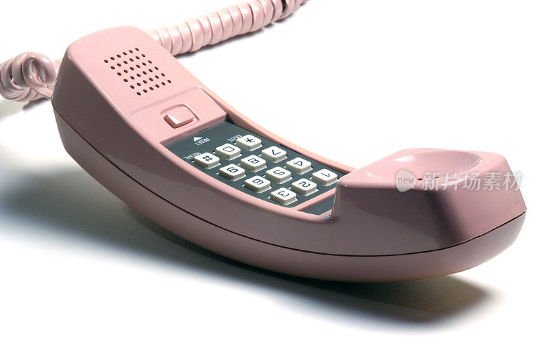 孤立的粉红色复古电话听筒
