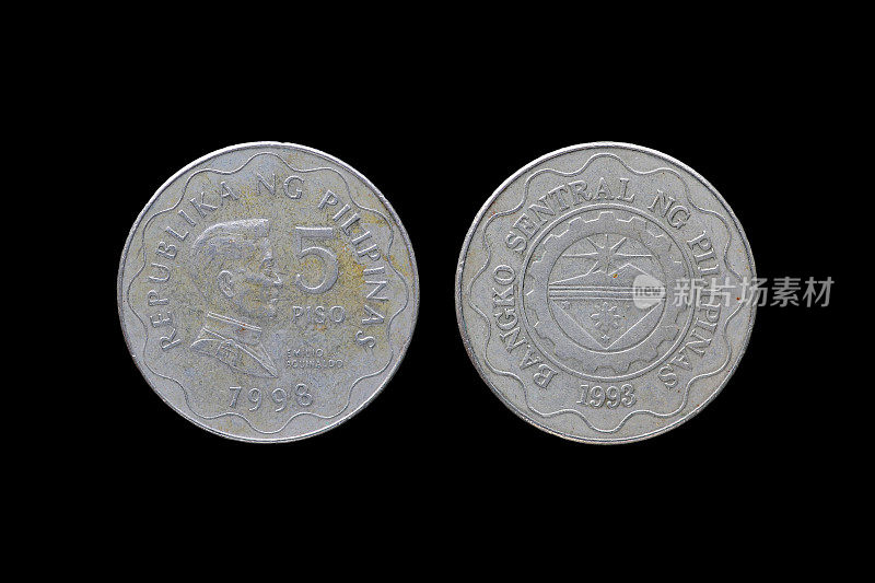 菲律宾硬币孤立在黑色背景。