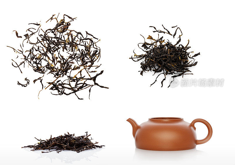 茶壶和中国生茶堆孤立在白色