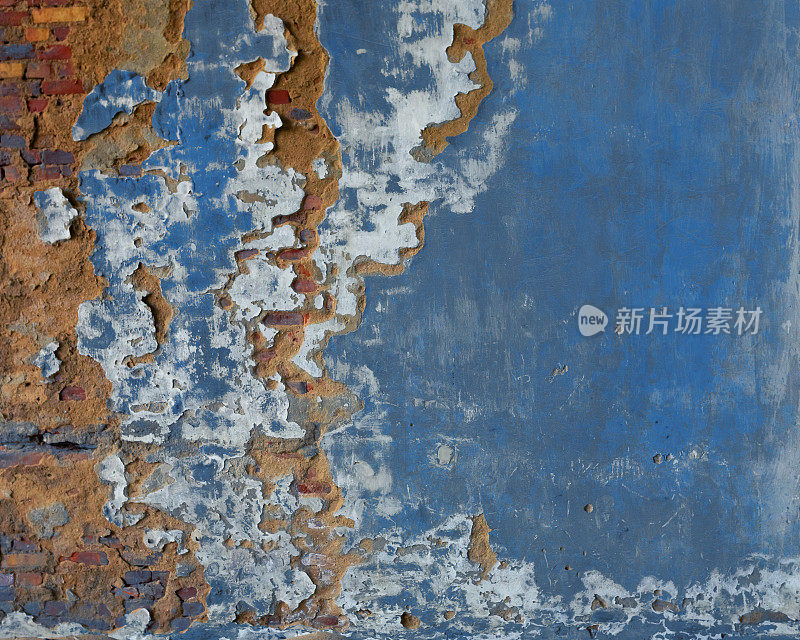 抽象背景-受损的砖墙与剥落的蓝色油漆