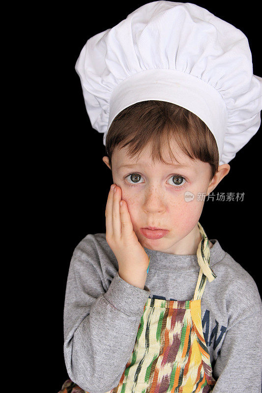 可爱的小厨师与悲伤的表情