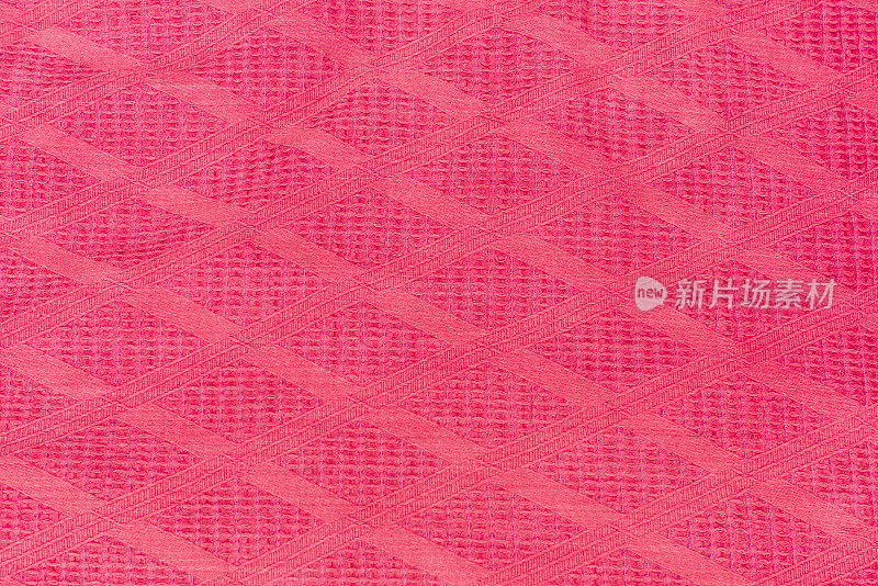 粉红色的红色织物图案，织物纹理结构饱满的框架背景