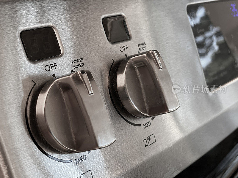 厨房炉子或烤箱旋钮的特写
