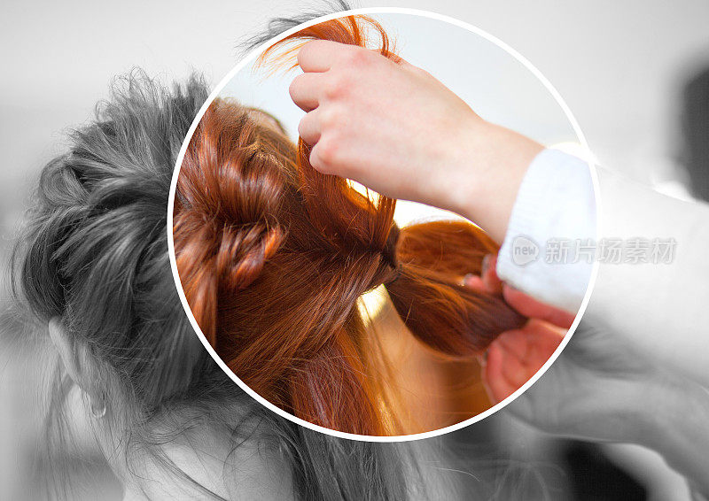 美丽的红发女孩，理发师编着辫子，这是美容院的特写。专业的头发护理和创造发型。