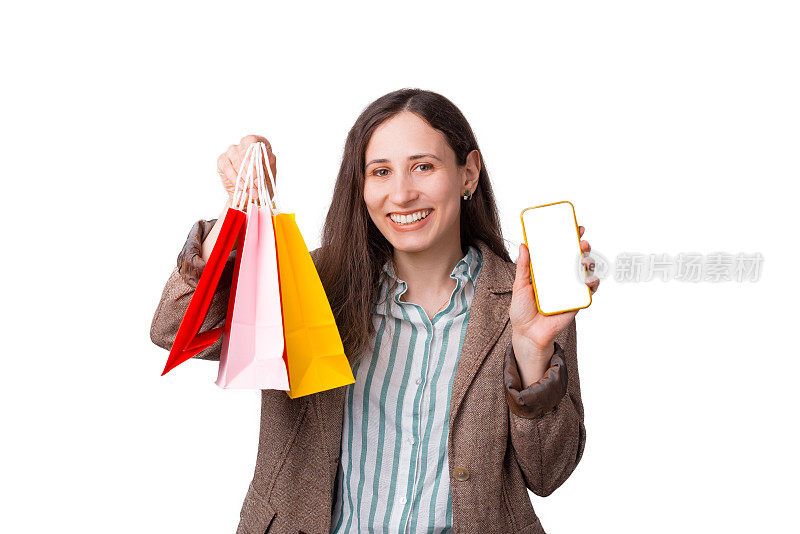 不要浪费时间-网上购物。女孩拿着购物袋和手机。