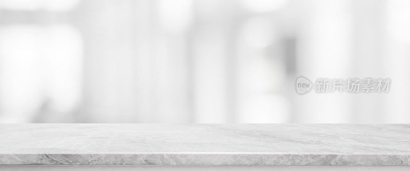 白色石材大理石桌面和模糊抽象背景从室内建筑横幅背景-可以用于展示或蒙太奇您的产品。