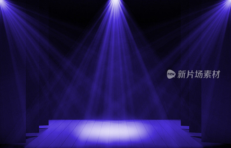 舞台灯，自由舞台，音乐会舞台。天花板上有几台放映机。聚光灯穿过黑暗照到地板上。