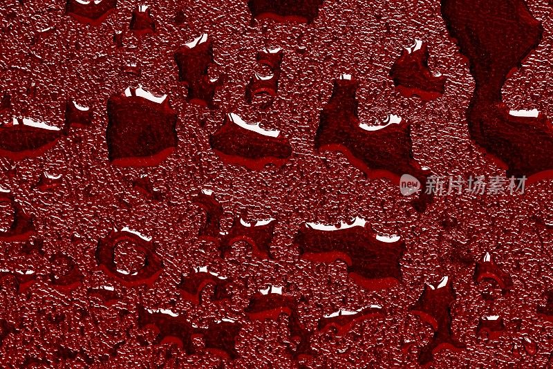 潮湿粗糙的红色纹理与水滴