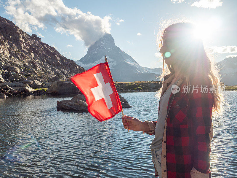 泽马特，一个拿着瑞士国旗的女人