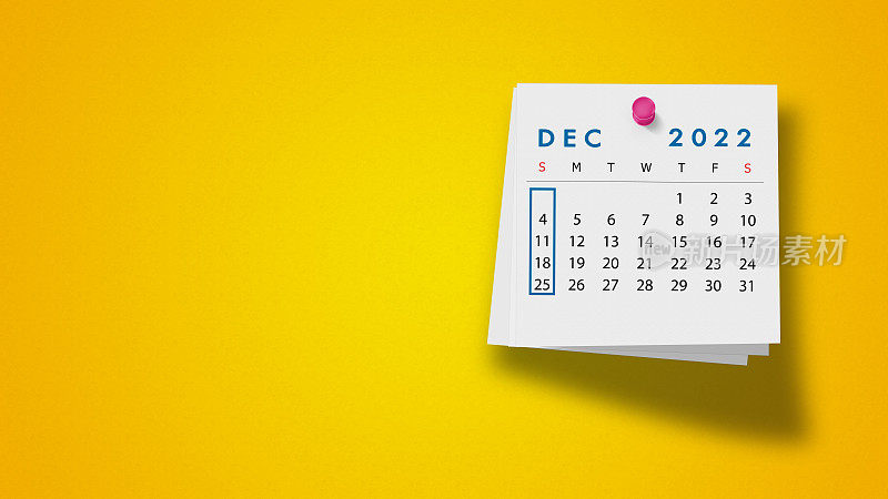 在记事本上的2022年12月日历，背景为黄色