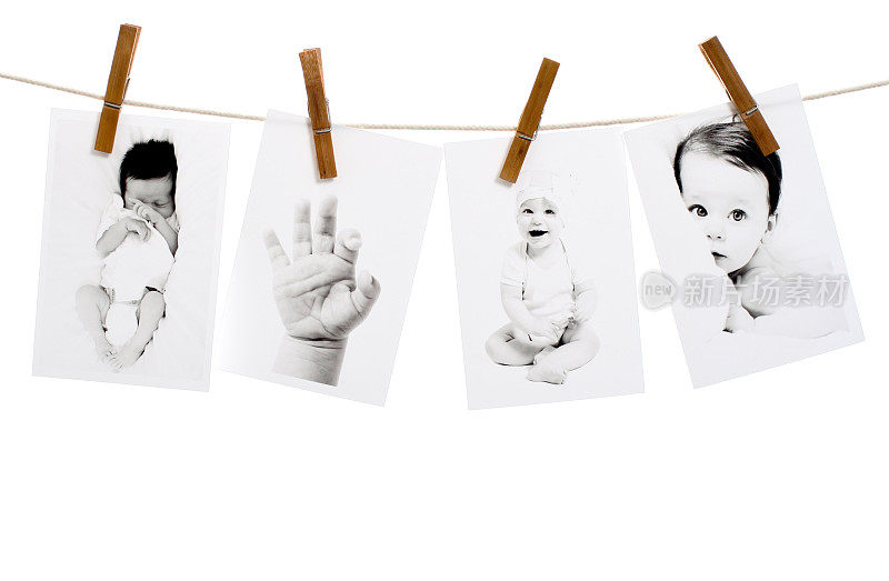 四张婴儿挂在晾衣绳上的照片
