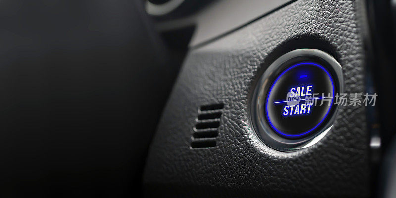业务动机的概念。点火按钮与销售开始文字在真实的汽车仪表盘。