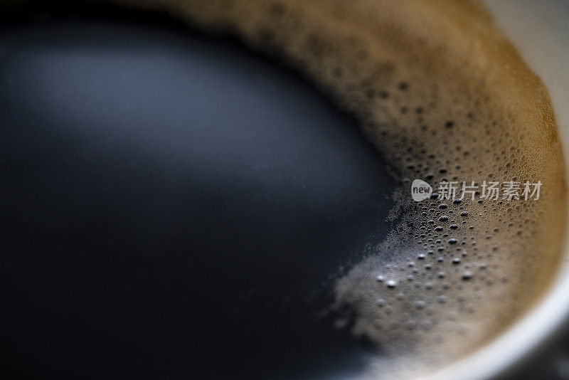 咖啡杯微距泡沫和泡沫特写
