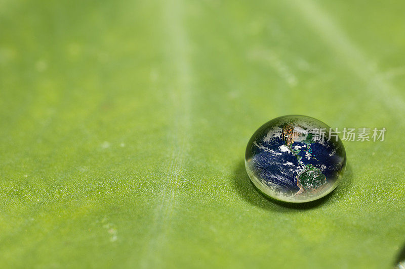 树叶上的水滴反映了大地的概念