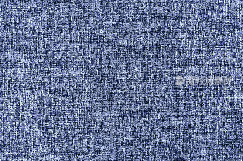 蓝色装饰织物的质地。装饰用纺织品的背景