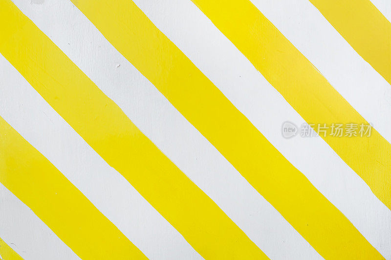 白色和黄色条纹画墙背景