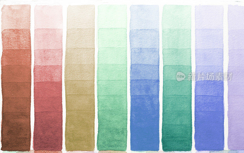 调色板的阴影水彩不同的颜色画在白纸上。