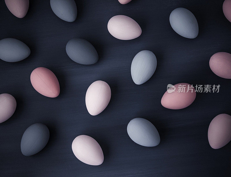 手绘灰色和粉红色的渐变复活节彩蛋背景