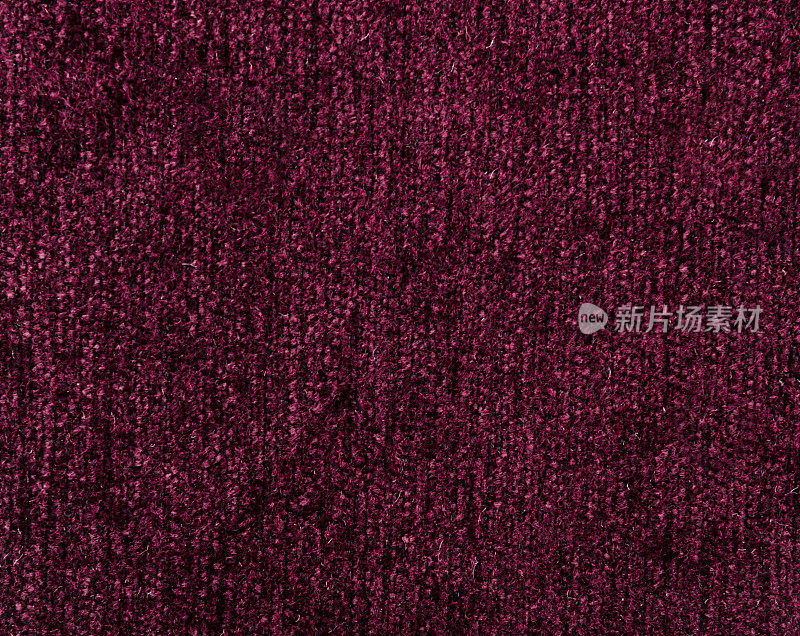 粗糙的深紫色纺织品背景