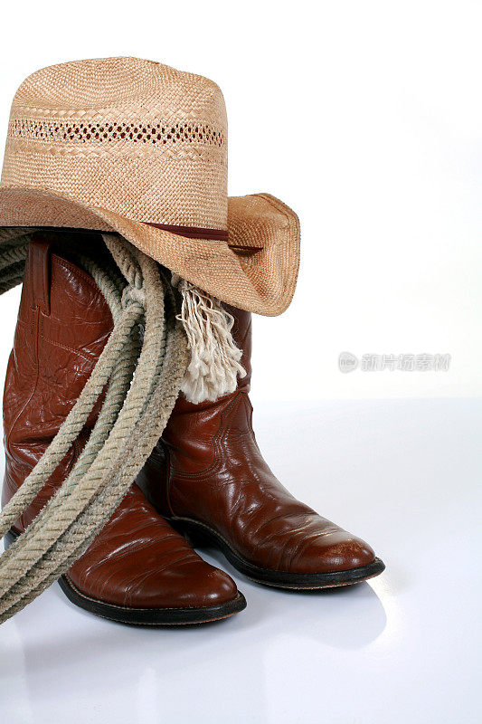 牛仔靴、帽子和绳子