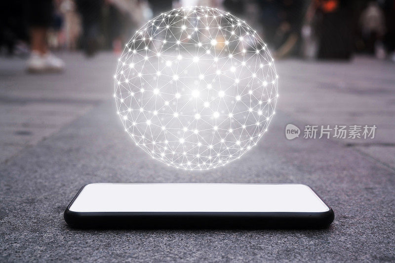 智能手机躺在地上，多边形网格球体，未来的概念