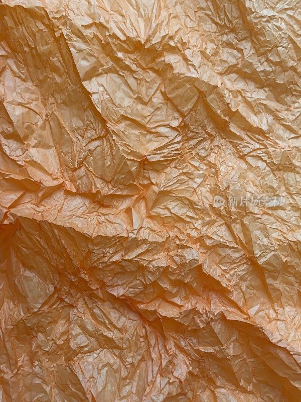 橙色皱褶薄纸