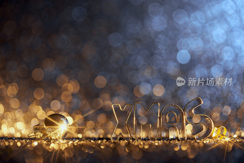 闪闪发光的金色圣诞星-装饰装饰散焦散焦背景